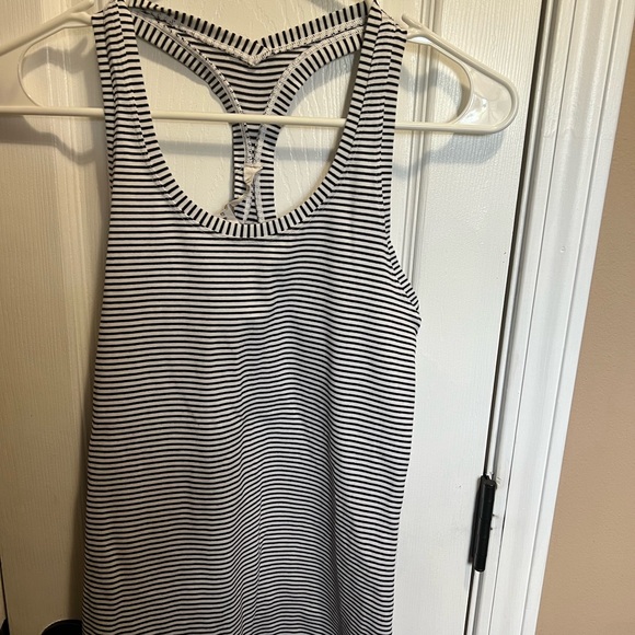 Tank top, worn a few times, no holes. Non smoke home - Picture 2 of 3